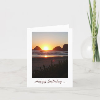 Tarjeta Feliz cumpleaños, puesta de sol en la playa con lo