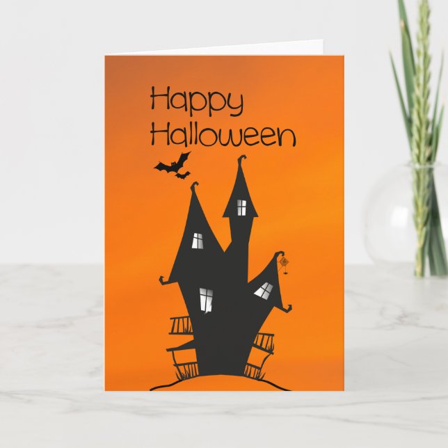 Tarjeta Feliz Halloween con una casa de brujas embrujada (Anverso)