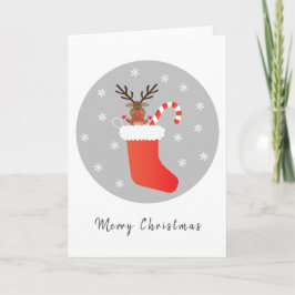 Tarjeta Feliz Navidad a los renos sacudiendo candy cane