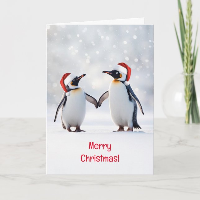 Tarjeta Feliz Navidad con pingüinos en la nieve (Anverso)
