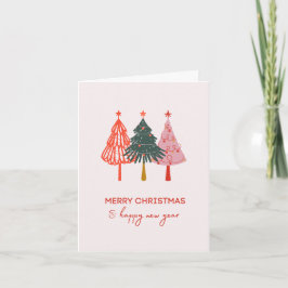 Tarjeta Feliz Navidad en los árboles navideños