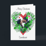 Tarjeta Feliz Navidad | Foto de Navidades del corazón<br><div class="desc">Tarjeta de Navidades personalizada. Marco floral de corazón verde,  rojo y blanco que puedes personalizar añadiendo tu imagen.</div>