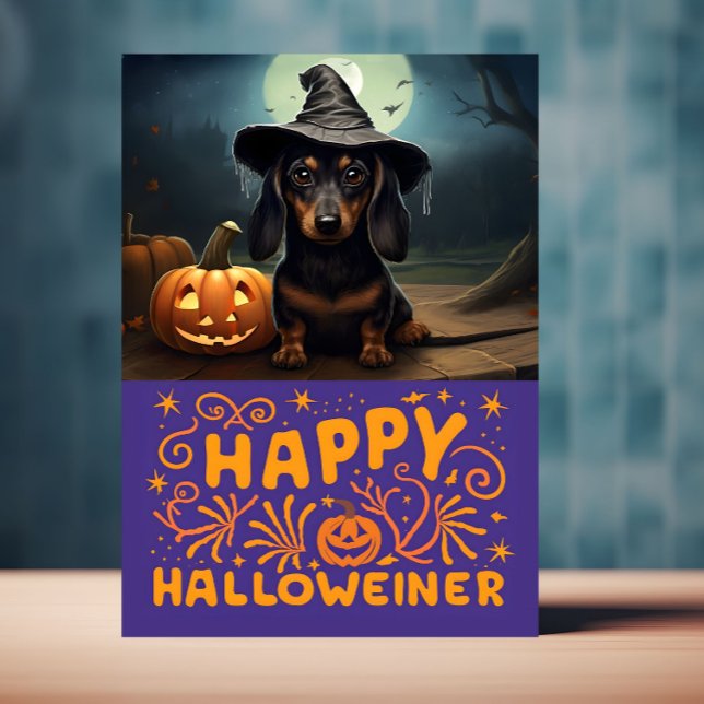 Tarjeta Feliz perro salchicha de Halloween (Halloween card with Weiner dog on front is displayed on a table top)