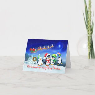 Tarjeta Feliz Pingüino de Navidad con el Sleigh de Santa