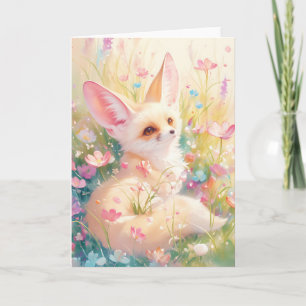 Tarjeta Fennec Fox descansa en un prado floreciente