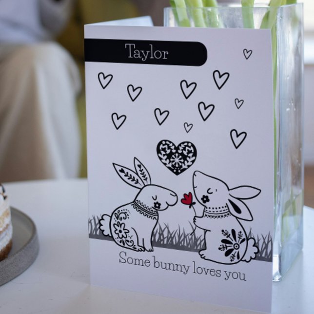 Tarjeta Festiva A algunos conejos les encanta San Valentín persona (Some Bunny Loves You Rabbit Personalized Valentine Card by Ricaso. Two cute bunnies with flower)
