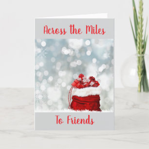 TARJETA FESTIVA A TRAVÉS DE MILLAS PARA NAVIDADES "AMIGOS"