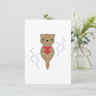 Tarjeta Festiva Adorable Otter abrazando un corazón