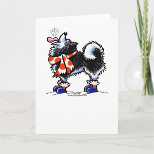Tarjeta Festiva Alaskan Malamute toma un copo de nieve