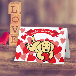 Tarjeta Festiva Amarillo Labrador Puppy masticando el corazón Vale