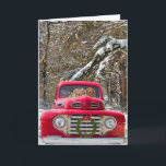 Tarjeta Festiva Aniversario del Boda Navidades<br><div class="desc">Par de recuperadores dorados en una camioneta roja vintage en bosques de invierno.</div>