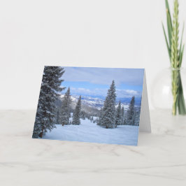 Tarjeta Festiva Árboles y montañas cubiertos de nieve
