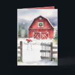 Tarjeta Festiva Barn De Navidades De Agua Y Snowman<br><div class="desc">Granero rojo con Navidades verdes corona,  muñeco de nieve y antigua valla rústica en copos de nieve.</div>