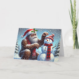 Tarjeta Festiva Bigfoot Making Snowman Christmas