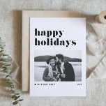 Tarjeta Festiva Black Retro Negrita Typography Photo Happy Holiday<br><div class="desc">¡Felices Fiestas! Envíe sus deseos de vacaciones a la familia y amigos con esta moderna tarjeta de vacaciones de personalizable. Presenta una tipografía retro audaz con acento de árbol de Navidad. Personalice esta tarjeta de vacaciones con fotos agregando sus propios detalles. Esta tarjeta negra y blanca de vacaciones felices está...</div>