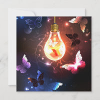 Bombilla brillante con mariposas nocturnas