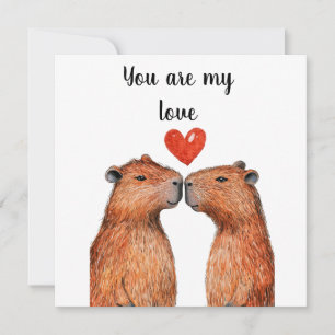 Tarjeta Festiva bonitos animales capibaras con corazones pintados