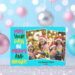 Tarjeta Festiva Bright Blue Merry Christmas Two Collage de fotos<br><div class="desc">Cuidadas y alegres tarjetas de vacaciones de collage de fotos familiares con una colorida cadena de luces de Navidades envueltas alrededor de tus dos fotos favoritas de los niños. Que tus días sean amargos y brillantes escritos en negrita. Un arcoiris de colores para las vacaciones. Añade tus dos imágenes verticales...</div>