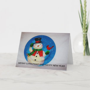 Tarjeta Festiva Brillante Snowman colgado en el cierre de una TARJ