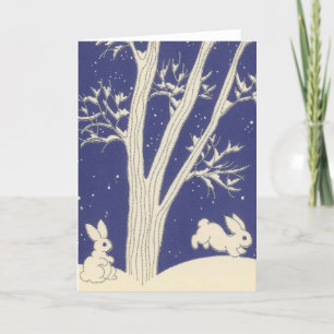 Tarjeta Festiva Bunnies blancos azules atrapados en la nieve