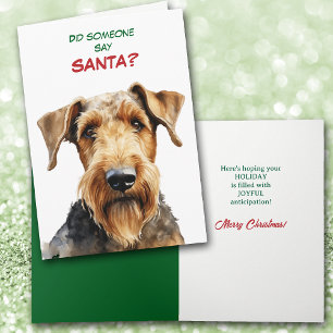 Tarjeta Festiva Cachorro adorable Airedale Terrier busca a Santa