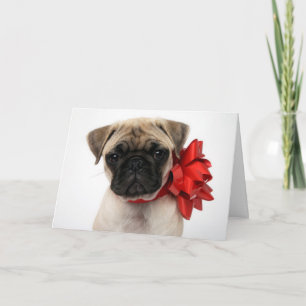 Tarjeta Festiva Cachorro de cachorro envuelto en una reverencia de