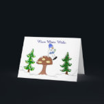 Tarjeta Festiva Calurosos deseos de invierno - Snowman<br><div class="desc">Un encantador muñeco de nieve sentado en la cima de una seta sosteniendo un bastón de caramelo...  ¡una bonita escena de invierno!</div>