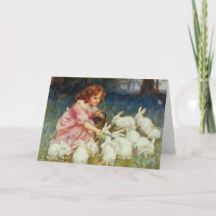Tarjeta Festiva Chica de Pascua antigua alimentando conejos blanco