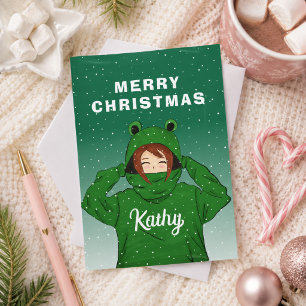 Tarjeta Festiva Chica linda con capucha de rana verde Dibujo Navid