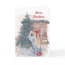 Chicas de época decorando Navidades de la chimenea