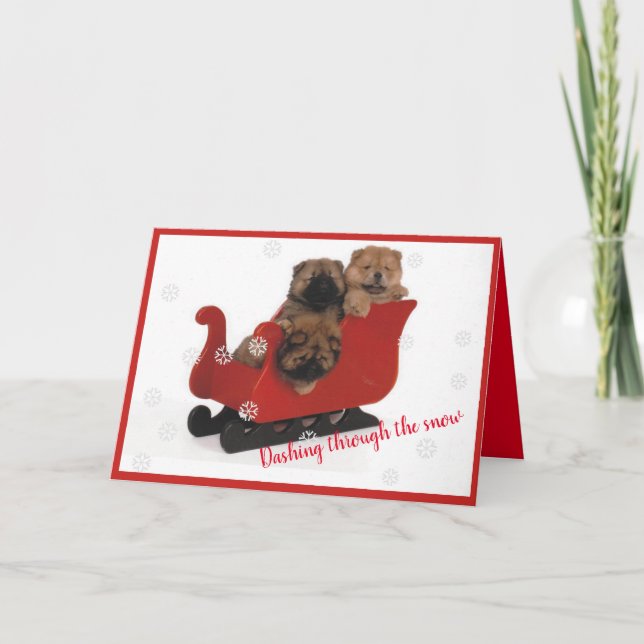 Tarjeta Festiva Chows cayendo a través de la nieve (Anverso)