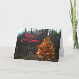 Tarjeta Festiva Christmas Tree on Back Deck With Trees & Lake