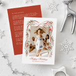 Tarjeta Festiva Cinta roja festiva con Poinsettias y vegetación<br><div class="desc">Envíe a su familia y amigos una actualización familiar y un mensaje de alegría navideña con esta tarjeta de Navidades de una foto con ilustraciones dulces, dibujados a mano, de una cinta rojiza rojiza acentuada con brotes festivos de flores de poinsettia roja y vegetación. Los tipos de letra tradicionales mantienen...</div>