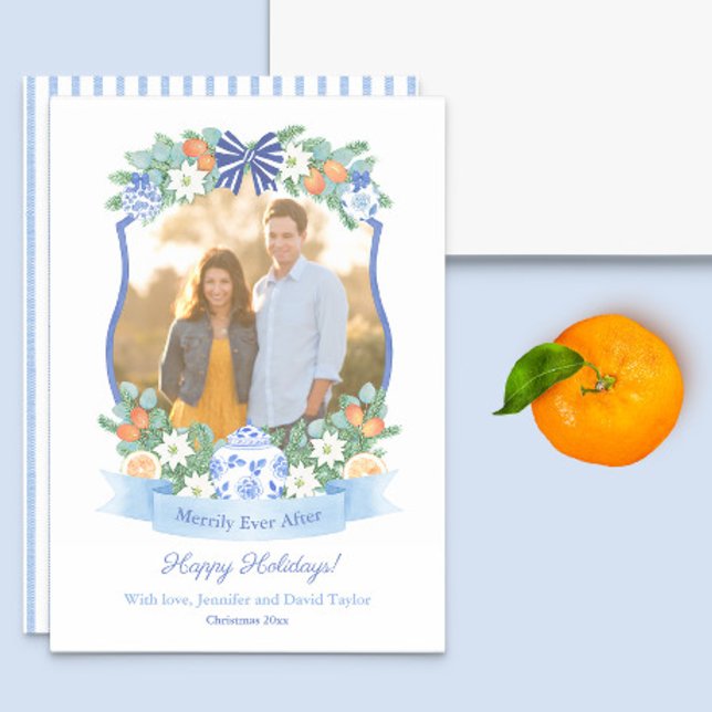 Tarjeta Festiva Citrus Azul Y Blanco Nuestra Primera Imagen De Nav (This Holidays photocard features a blue and white crest with watercolor greenery and citrus motifs)