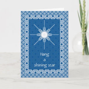 Tarjeta Festiva Colgar una estrella brillante