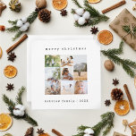 Tarjeta Festiva Collage de fotos de la familia de la máquina de es<br><div class="desc">Esta sencilla y moderna tarjeta de Navidades de fotografía familiar incluye un lugar para que agregues tus nombres, y un alegre mensaje de Navidad en la parte trasera de la hermosa tipografía de máquina de escribir, así como espacio para que añadas tu propio fotomontaje (con espacio para siete fotos). La...</div>