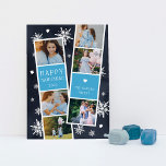 Tarjeta Festiva Collage de fotos Hanukkah con gota de nieve<br><div class="desc">La tarjeta de fotos Cute Hanukkah cuenta con dos tiras de cabina de fotos, cada una con tres fotos y un panel de texto azul, para un total de seis fotos. Personaliza con el año y tu apellido o nombres con insólitas letras blancas festivas, sobre un fondo azul marino salpicado...</div>