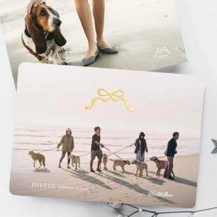 Tarjeta Festiva Con Relieve Metalizado simple lazo de navidad dorado minimalista foto