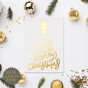 Tarjeta Festiva Con Relieve Metalizado Te deseamos una feliz tipografía navideña oro