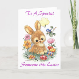 Tarjeta Festiva Conejito de pascua lindo con las flores y los