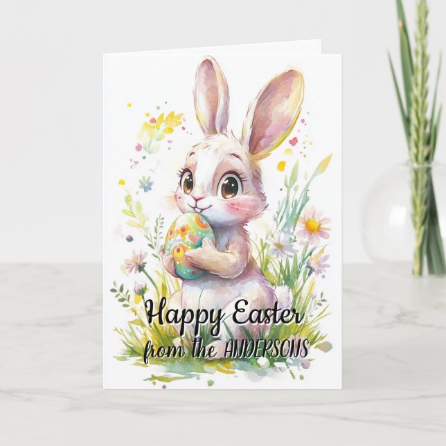 Tarjeta Festiva Conejito lindo sosteniendo huevo de Pascua y flore (Anverso)