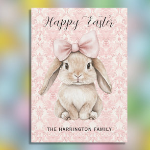 Tarjeta Festiva Conejo de Pascua feliz con lazo sobre damasco rosa
