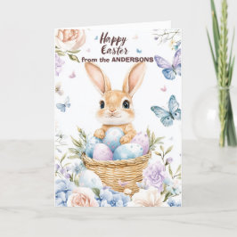 Tarjeta Festiva Conejo en la cesta con huevos de Pascua