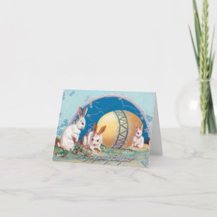 Tarjeta Festiva Conejos de conejo con huevos de Pascua