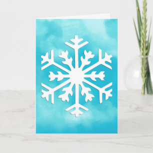 Tarjeta Festiva Copo de nieve blanco sobre fondo de acuarela azul