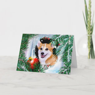 Tarjeta Festiva Corgi galés sonriente en la ventana de invierno