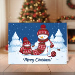 Tarjeta Festiva Crafty Snowman Knitus Scarf<br><div class="desc">Ilustracion vectorial de dos adorables hombres de nieve personalizado vestidos con gorras de punto y bufandas. El gran muñeco de nieve artesanal está tejiendo un pañuelo demasiado grande para el pequeño. La bufanda ya está envuelta varias veces alrededor del lindo muñeco de nieve.</div>