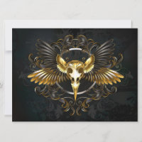 Cráneo de pájaro dorado sobre fondo negro