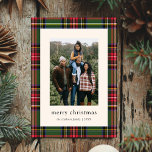 Tarjeta Festiva Cuatro Navidades fotográficos clásicos<br><div class="desc">La tarjeta de vacaciones Classic Plaid Four Photo Navidades incluye un marco tradicional de manto rojo y verde,  con una sola foto en la parte delantera y tres fotos en la parte posterior.</div>