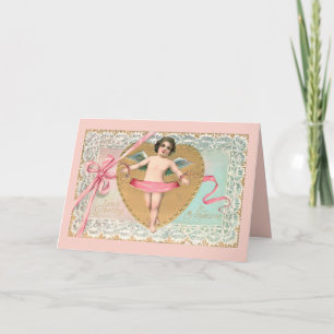 Tarjeta Festiva Cupido vintage con corazón dorado, encaje y cinta 